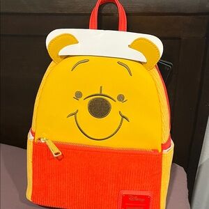 Loungefly Yellow & Red Winnie the Pooh Mini Backpack